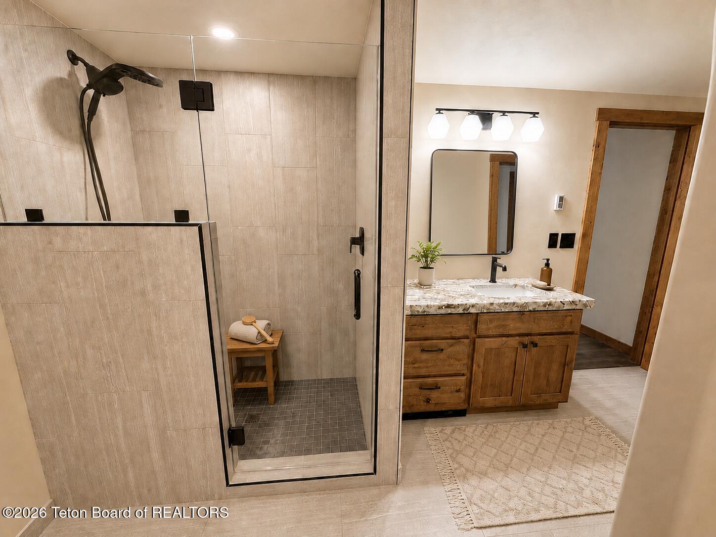 347 Alpine Mdw Loop Alpine, WY 83128 - Photo 15 of 27 AI Virtually Staged - Primary Bath
