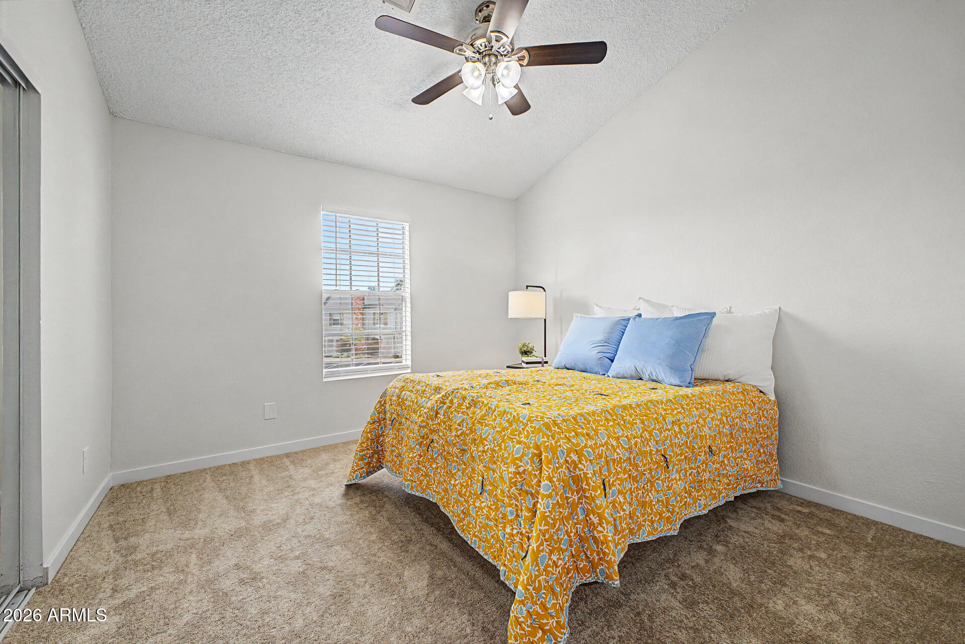 1601 North Saba Street, Unit 301 Chandler, AZ 85225 - Photo 15 of 35 a bedroom with a bed and window