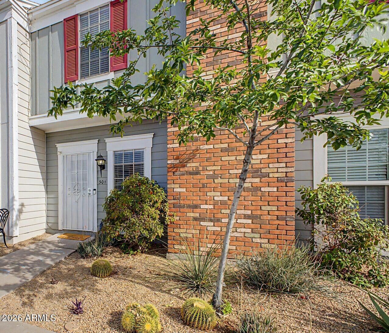 1601 North Saba Street, Unit 301 Chandler, AZ 85225 - Photo 2 of 35 a view of a house with potted plants