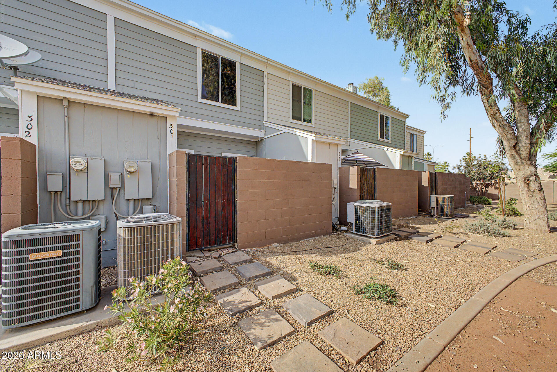 1601 North Saba Street, Unit 301 Chandler, AZ 85225 - Photo 24 of 35 a view of backyard of the house