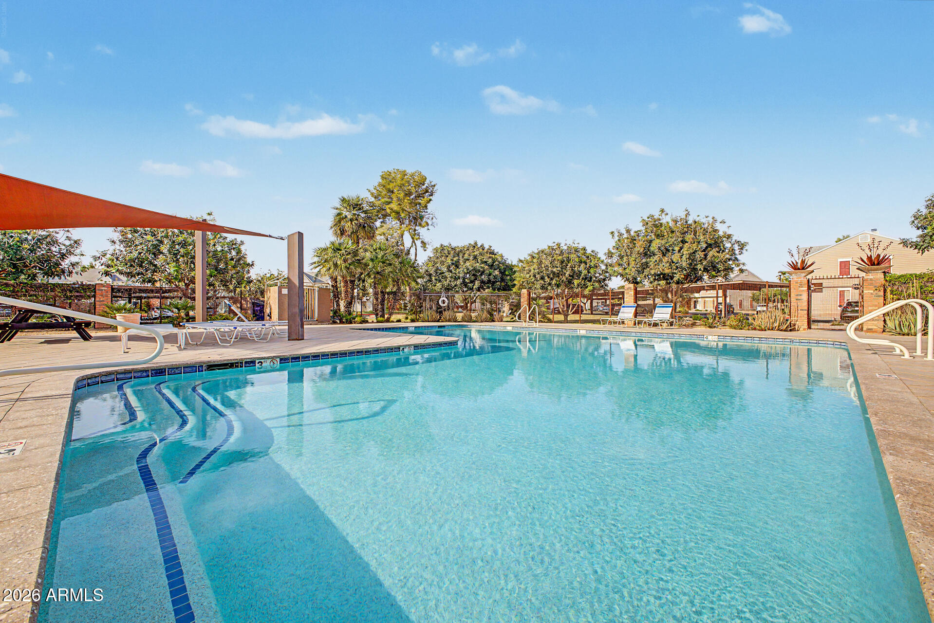 1601 North Saba Street, Unit 301 Chandler, AZ 85225 - Photo 27 of 35 a view of swimming pool with a lake view and mountain view
