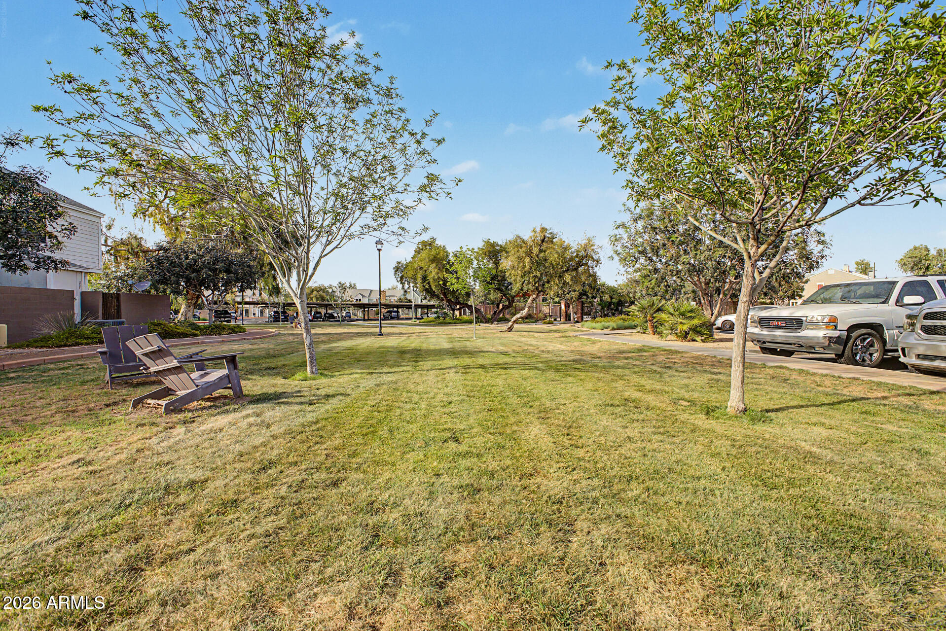 1601 North Saba Street, Unit 301 Chandler, AZ 85225 - Photo 34 of 35 a view of a lake with houses
