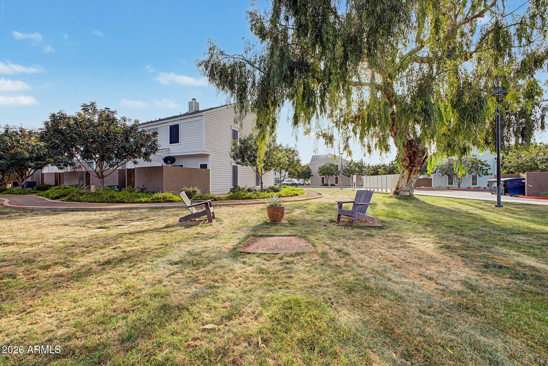 1601 North Saba Street, Unit 301 Chandler, AZ 85225 - Photo 35 of 35 a view of a yard with palm trees