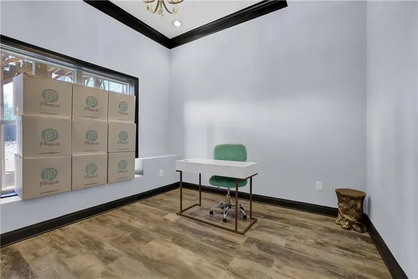 a workspace with furniture and a window