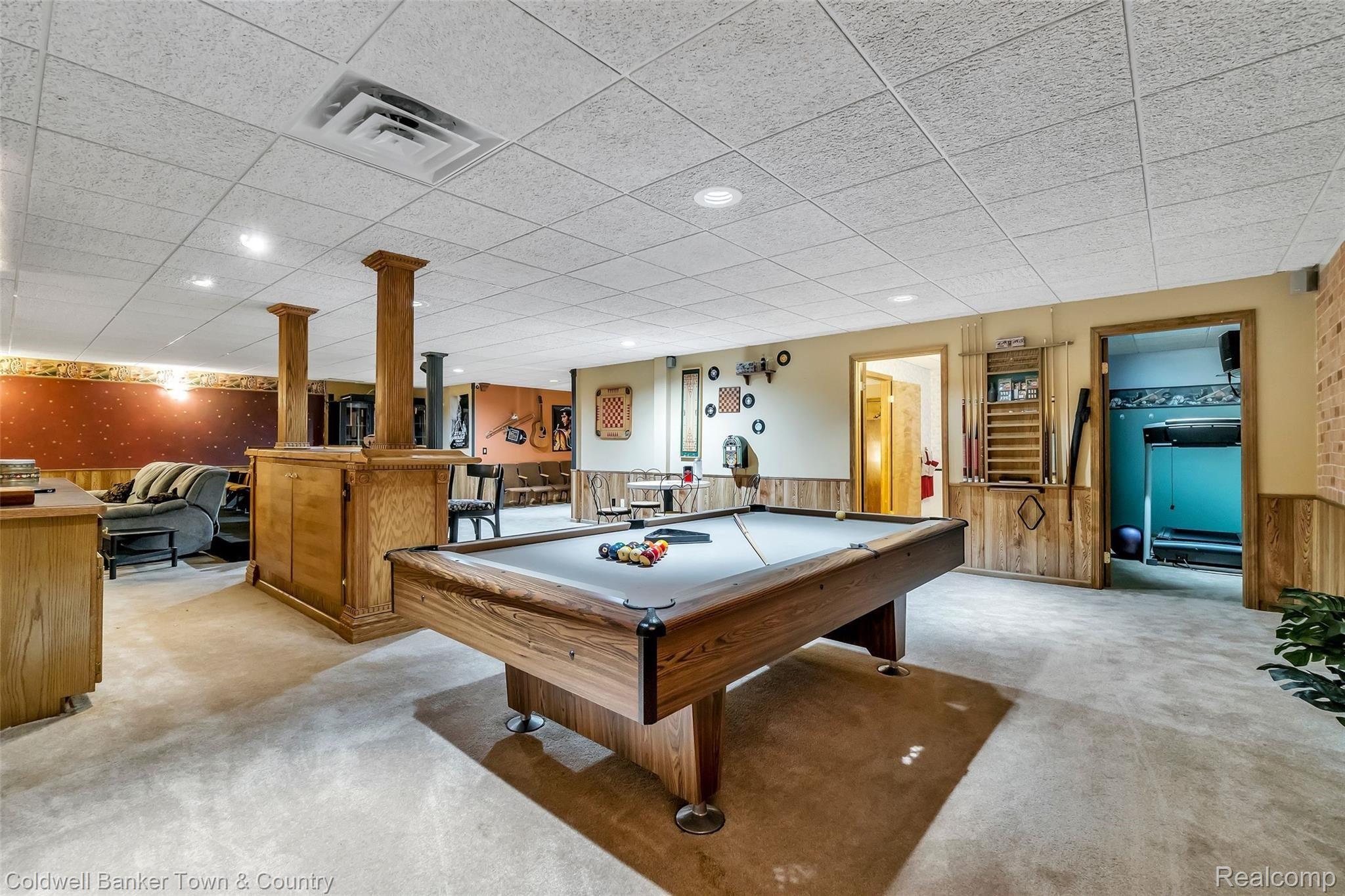 4233 Augusta Court Howell, MI 48843 - Photo 34 of 49 Lower Level Bar & Pool Table!