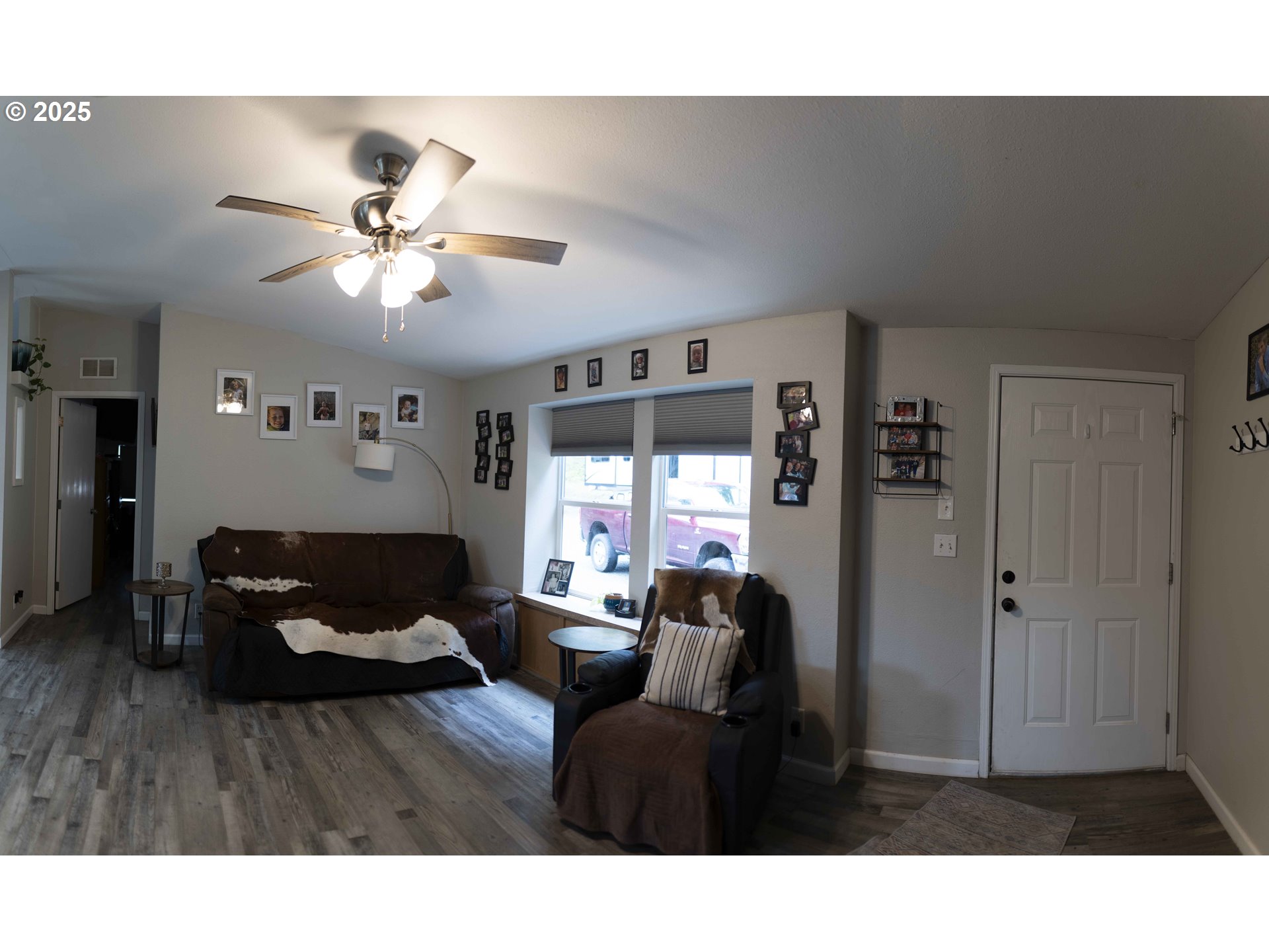 6228 Upper Cow Creek Road Azalea, OR 97410 - Photo 12 of 47 a living room with furniture and a large window