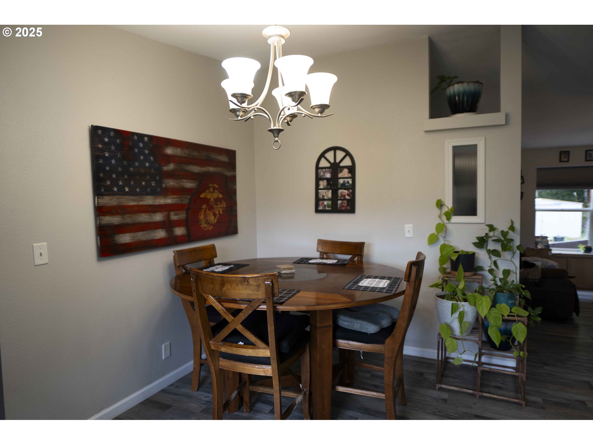 6228 Upper Cow Creek Road Azalea, OR 97410 - Photo 13 of 47 a view of a dining room with furniture and chandelier