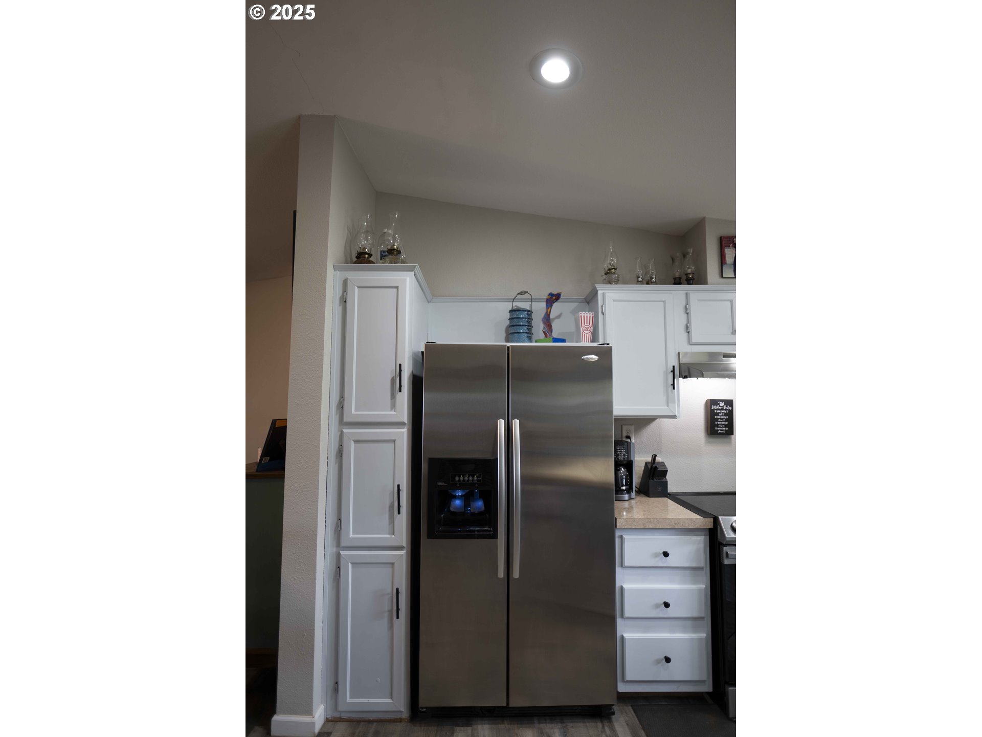 6228 Upper Cow Creek Road Azalea, OR 97410 - Photo 18 of 47 a view of a kitchen with refrigerator and cabinet
