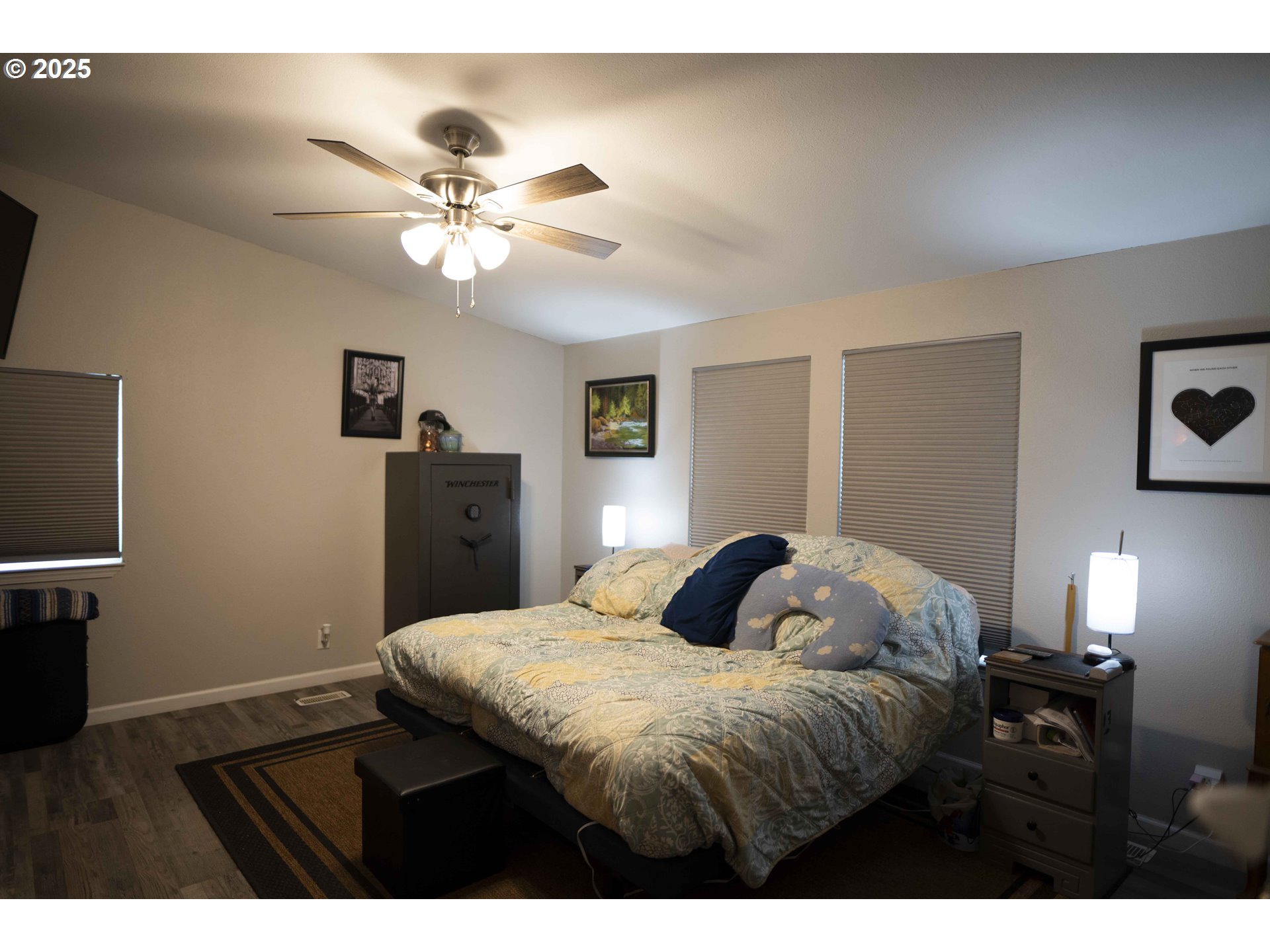 6228 Upper Cow Creek Road Azalea, OR 97410 - Photo 21 of 47 a bedroom with a bed and a chandelier