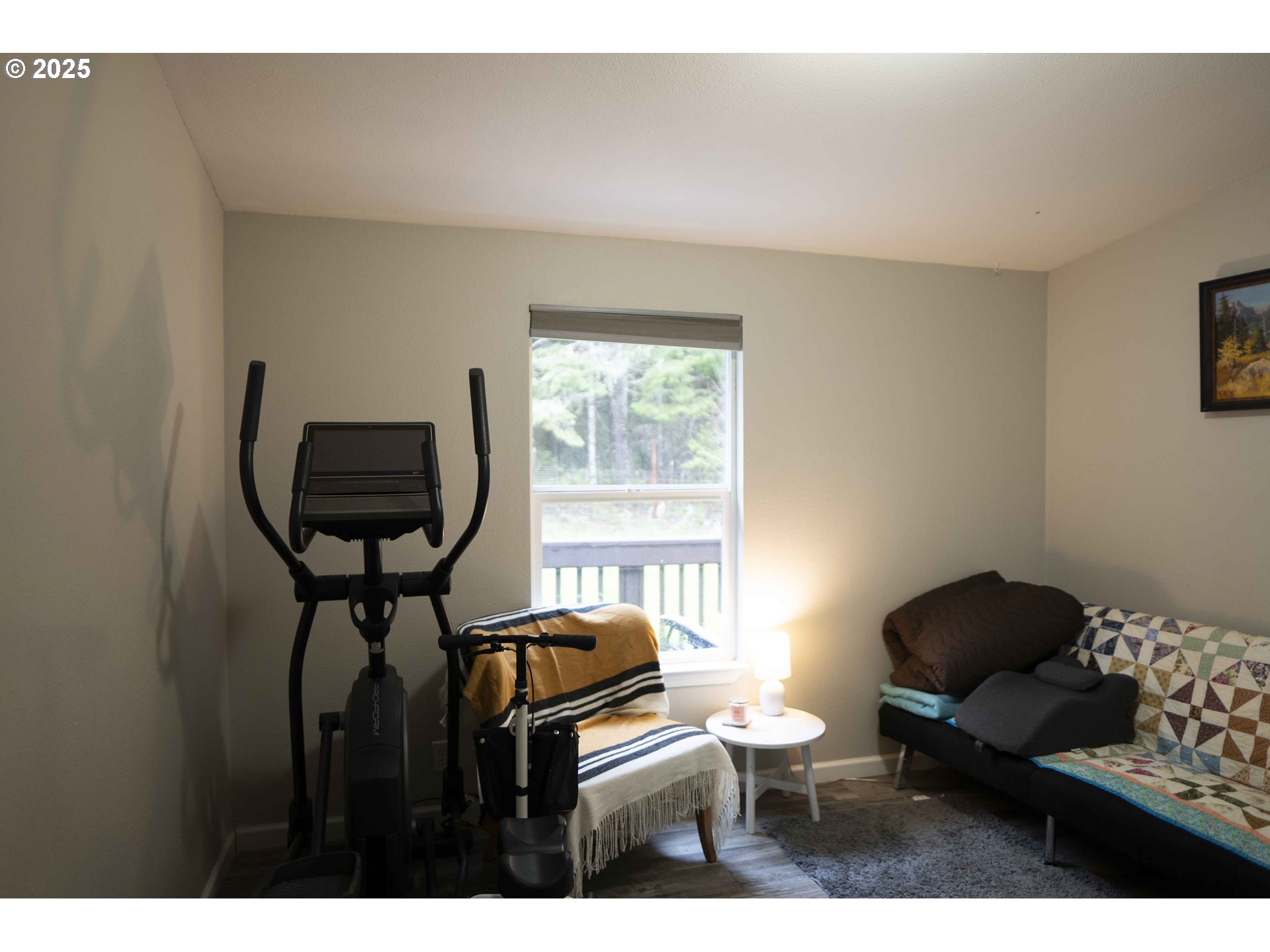 6228 Upper Cow Creek Road Azalea, OR 97410 - Photo 27 of 47 a living room with furniture and a window