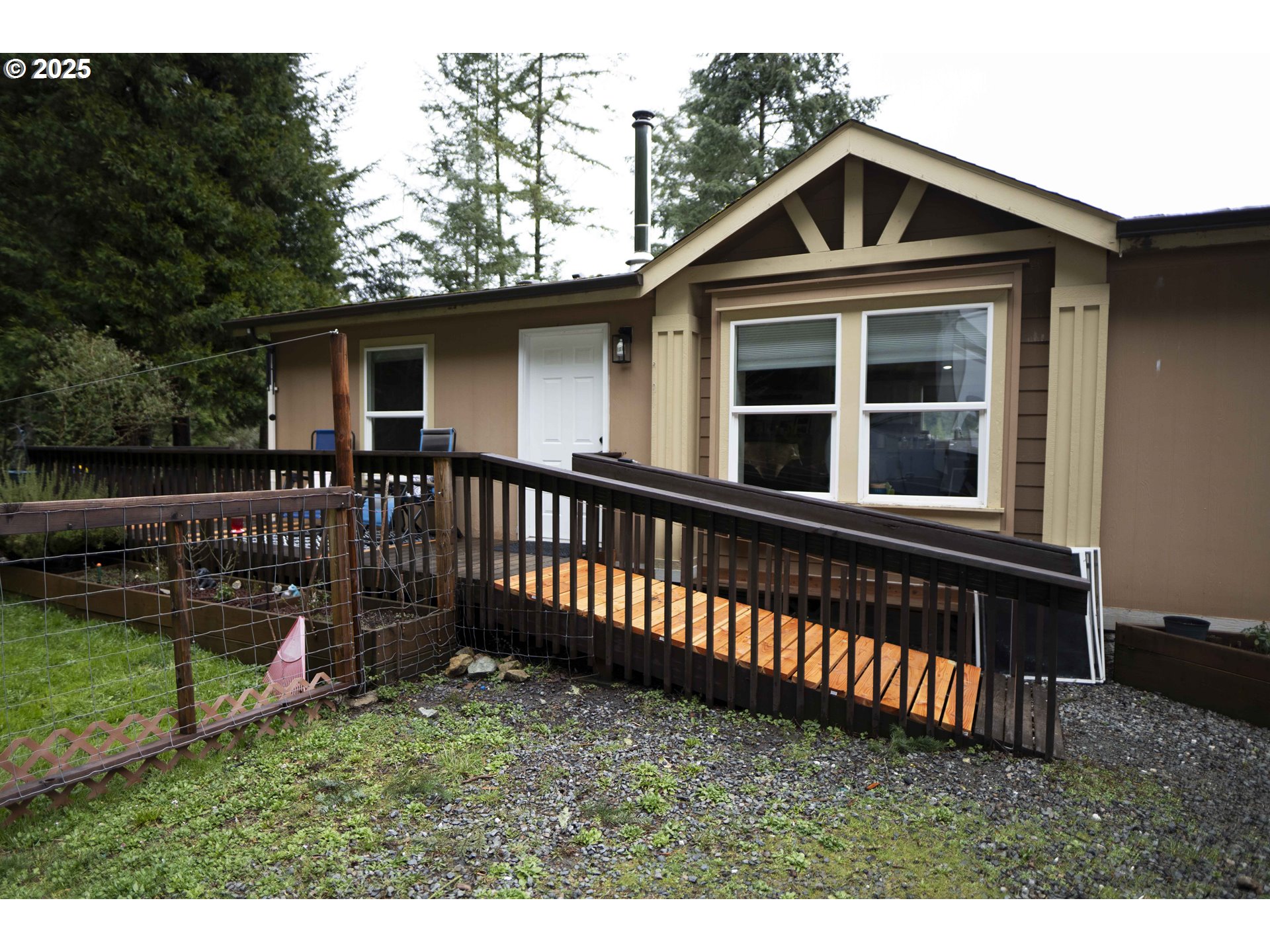 6228 Upper Cow Creek Road Azalea, OR 97410 - Photo 4 of 47 a front view of a house with a yard