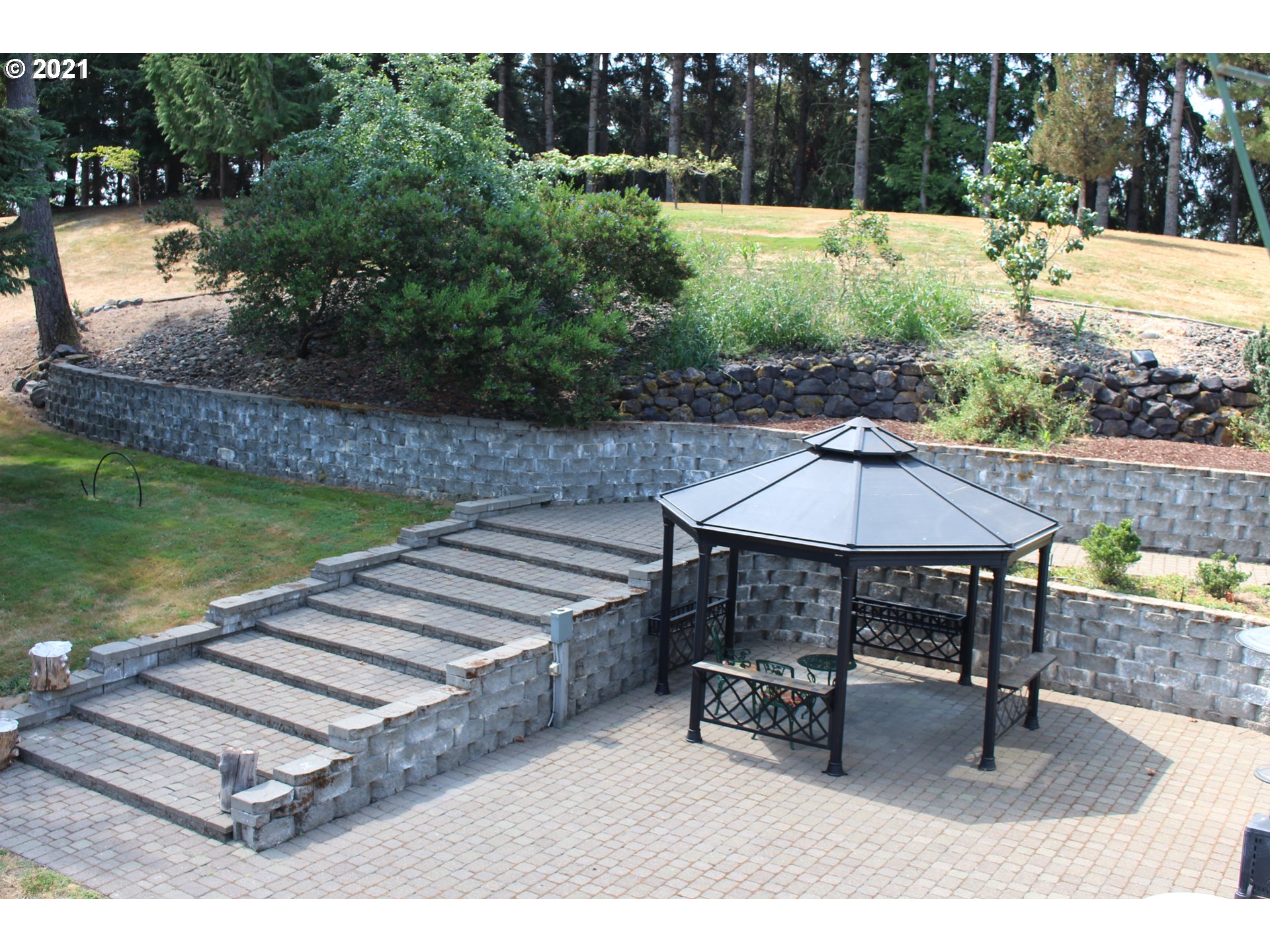 22711 Northwest 67th Avenue Ridgefield, WA 98642 - Photo 12 of 19 a view of a swimming pool with a patio