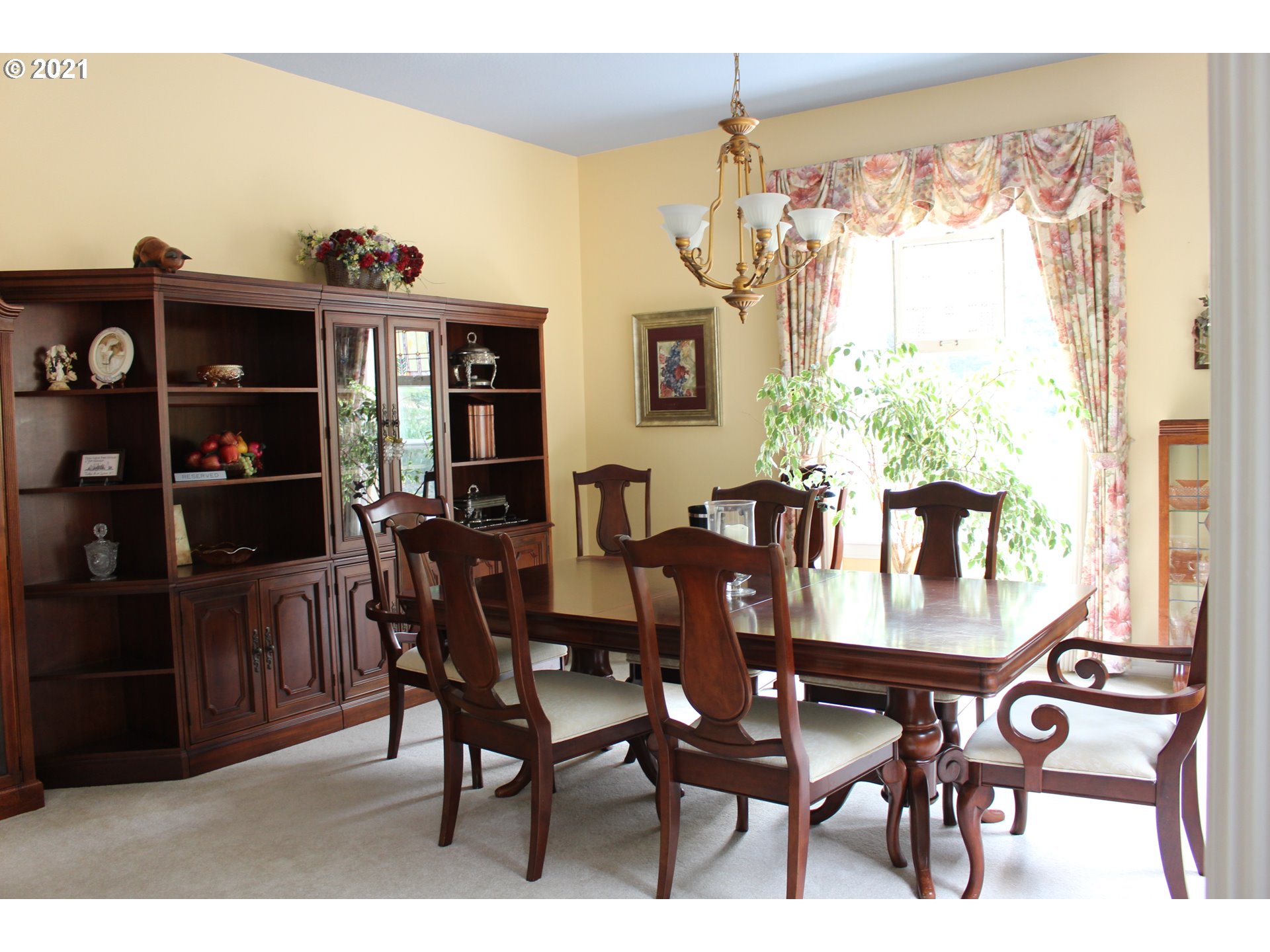 22711 Northwest 67th Avenue Ridgefield, WA 98642 - Photo 10 of 19 a view of a dining room with furniture window and outside view