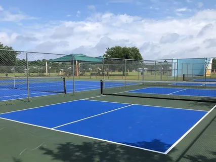 a view of an outdoor space and tennis court
