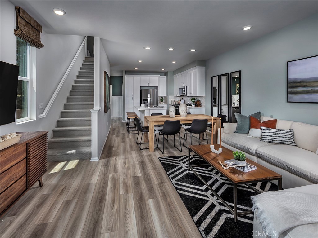 4725 Merida Way Oceanside, CA 92057 - Photo 6 of 13 Photos are not of the actual home, but are photos of the builder home with same floorplan with similar interior finishes.