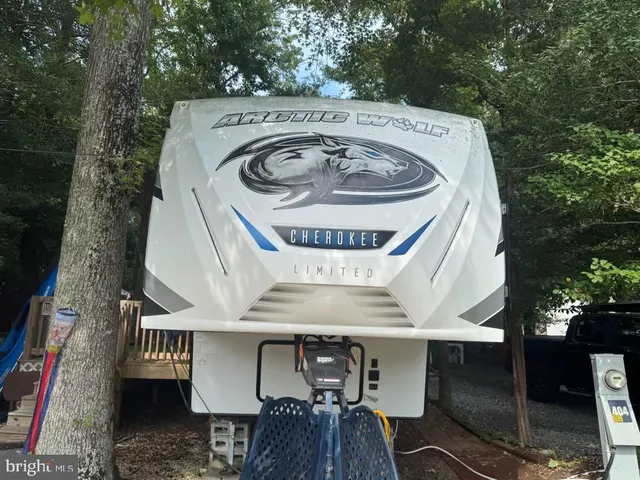 a view of barbeque area with seating space