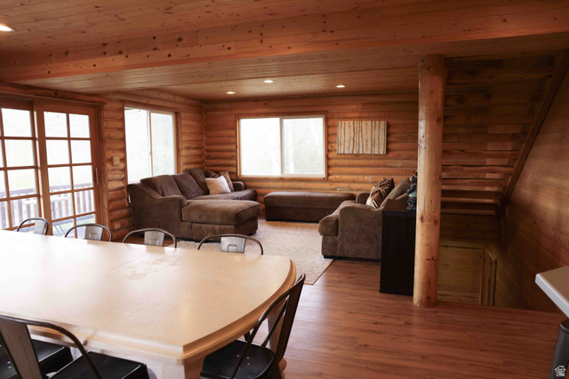 15253 Mill Road, Unit 62 Huntsville, UT 84317 - Photo 10 of 48 Spacious room featuring wood-finish flooring, wood plank walls, and a wood plank ceiling with recessed lighting