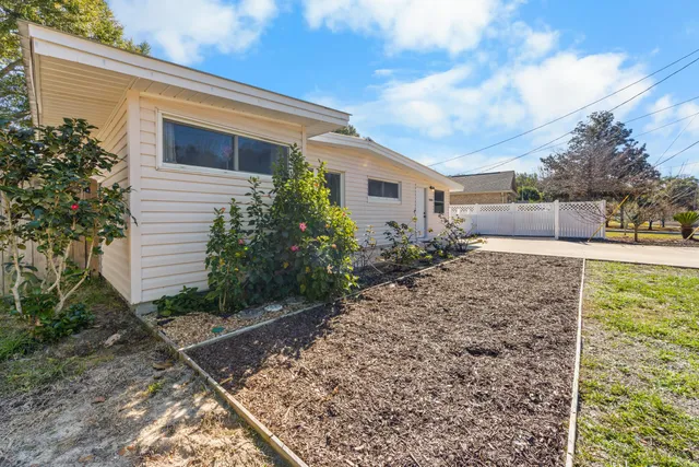 a kitchen with stainless steel appliances a refrigerator stove and microwave