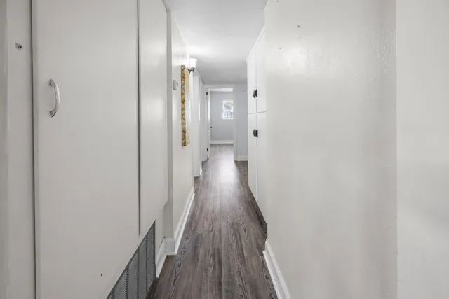 a bathroom with a sink a bathtub and a mirror