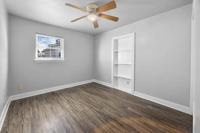 a view of washer and dryer with kitchen in the background