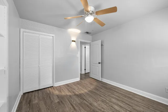 a view of a hallway with washer and dryer