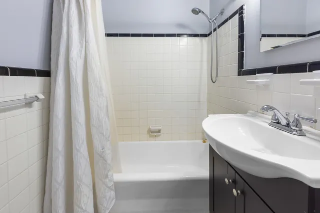 a view of a chair and table in the house