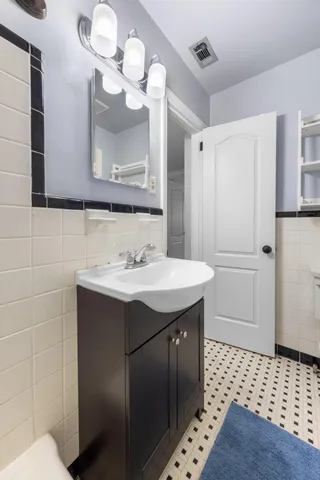 a view of a patio with a dining table and chairs