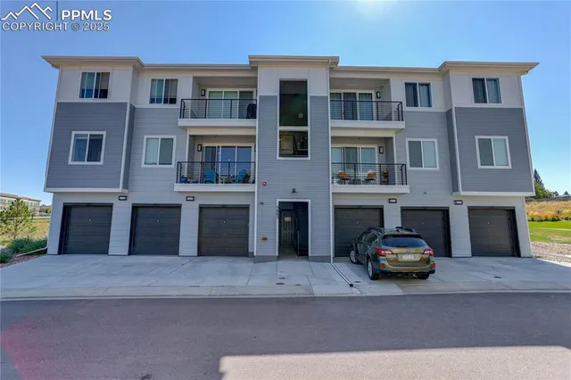 a car parked in front of a building