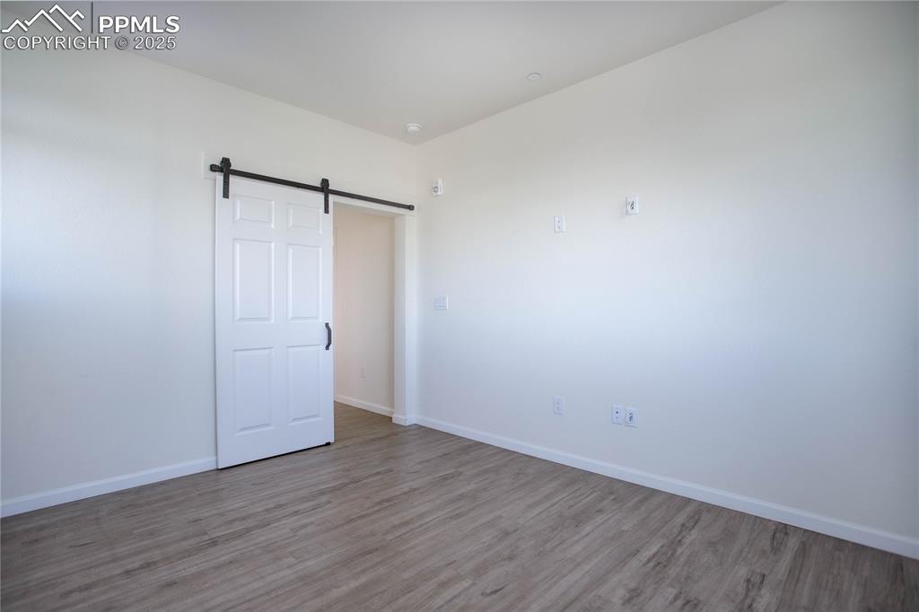 3865 Presidio Point, Unit 101 Colorado Springs, CO 80920 - Photo 11 of 20 a view of an empty room