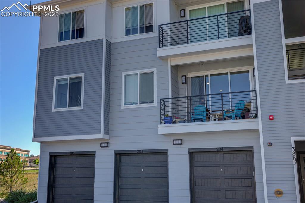 3865 Presidio Point, Unit 101 Colorado Springs, CO 80920 - Photo 20 of 20 a building view with a outdoor space