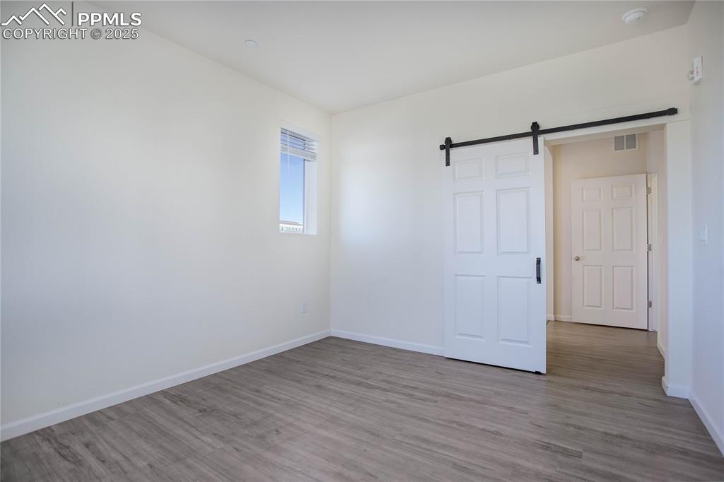 3865 Presidio Point, Unit 101 Colorado Springs, CO 80920 - Photo 10 of 20 a view of an empty room