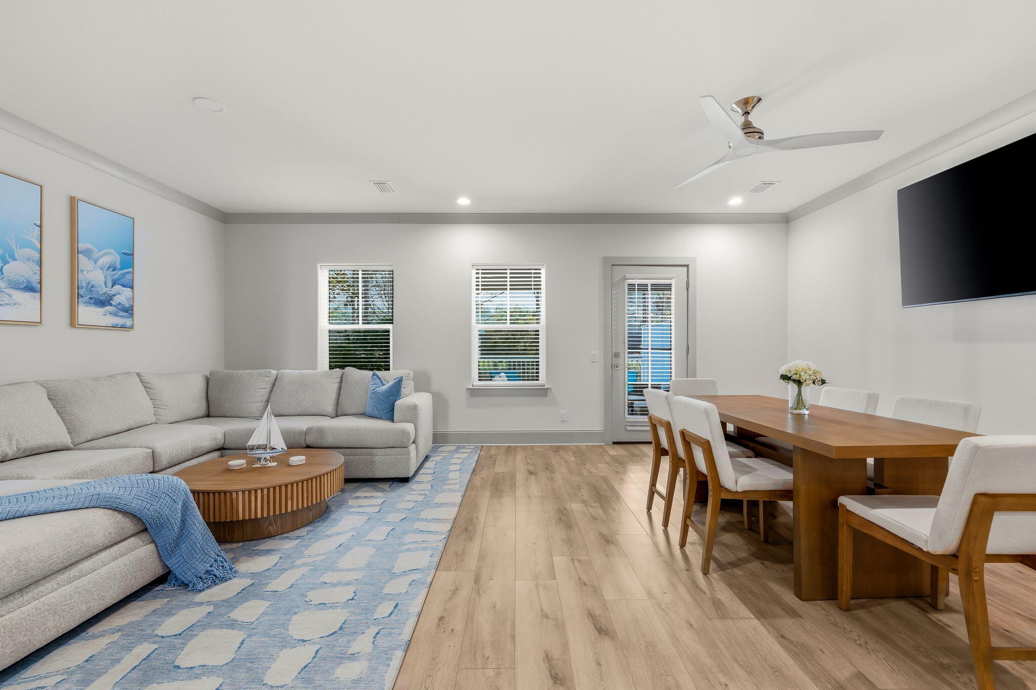 45 Golden Bell Court, Unit 45C Inlet Beach, FL 32461 - Photo 16 of 43 a living room with furniture a flat screen tv and a window