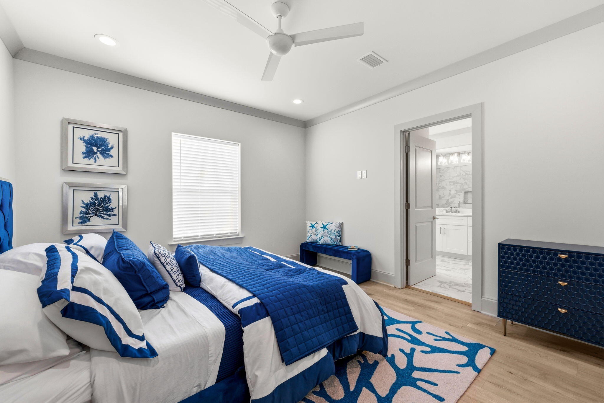 45 Golden Bell Court, Unit 45C Inlet Beach, FL 32461 - Photo 21 of 43 a bedroom with a bed and wooden floor