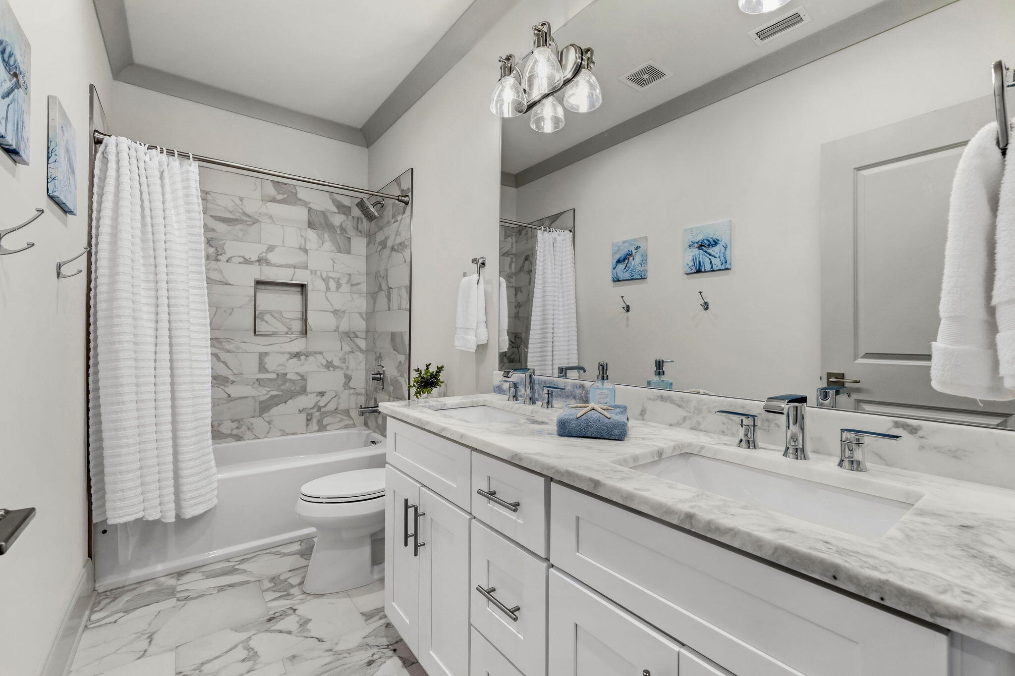 45 Golden Bell Court, Unit 45C Inlet Beach, FL 32461 - Photo 25 of 43 a bathroom with a granite countertop sink a toilet a mirror a vanity and shower