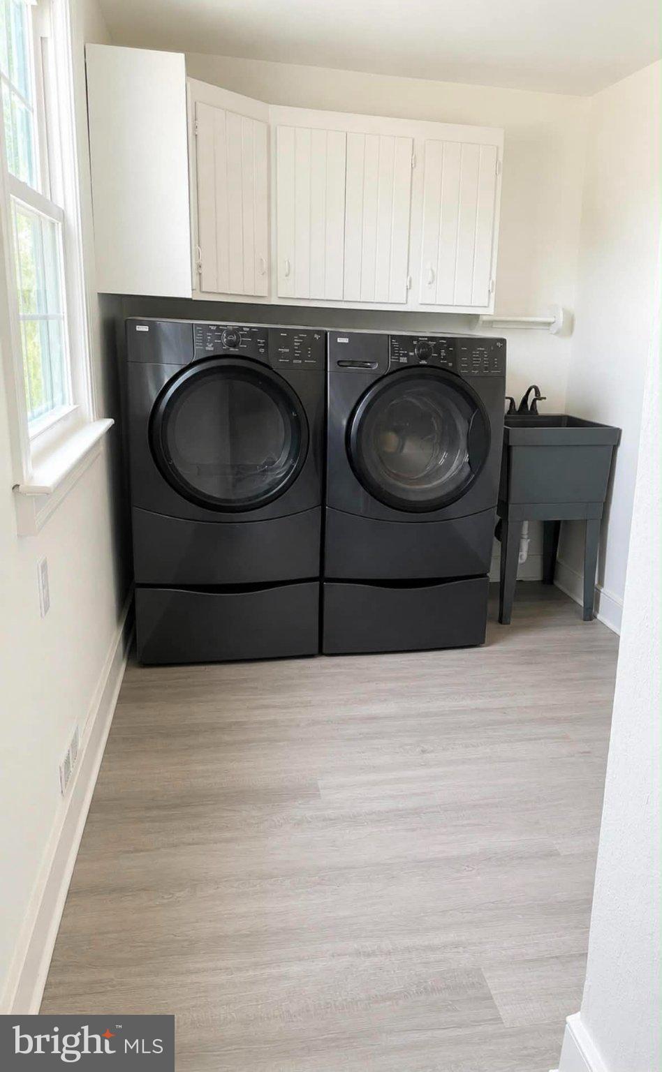 471 North Elmwood Road Marlton, NJ 08053 - Photo 10 of 26 Sleek laundry space with modern appliances.