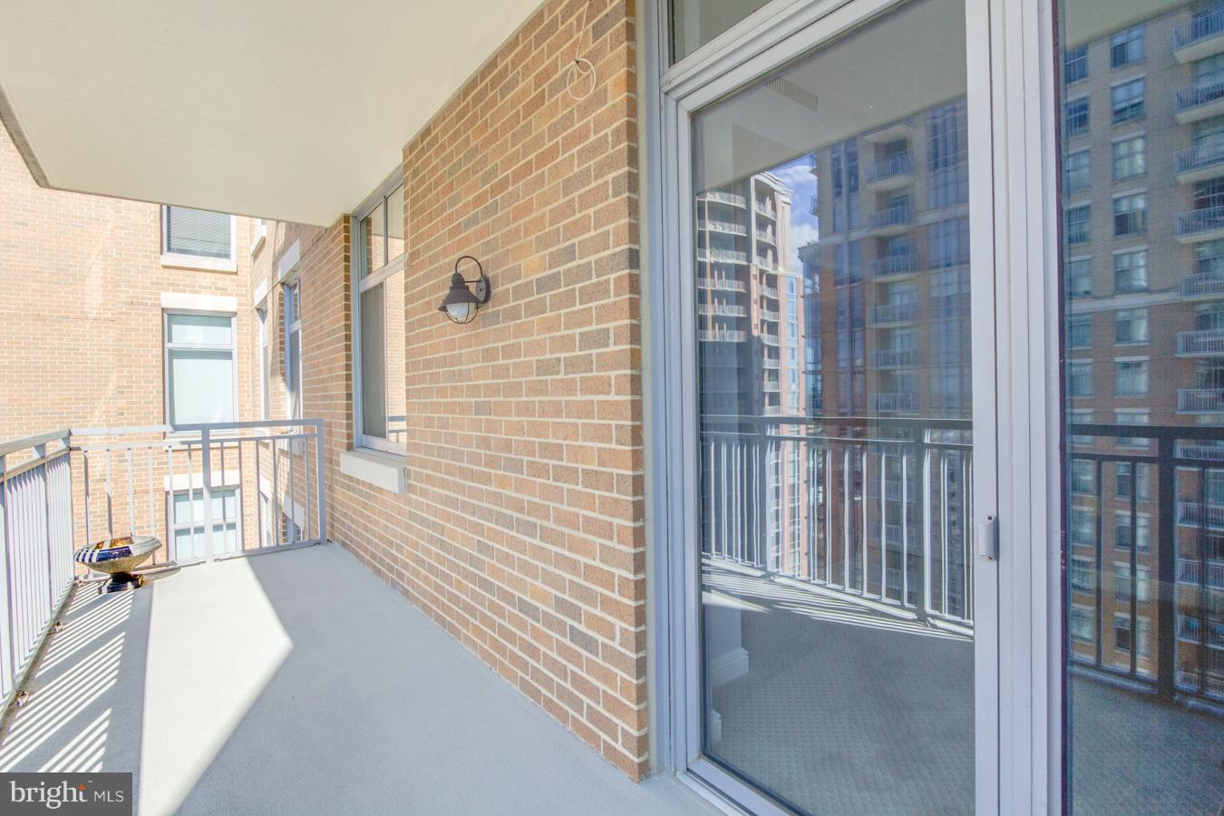11990 Market Street, Unit 1308 Reston, VA 20190 - Photo 17 of 30 a view of entry way with wooden floor