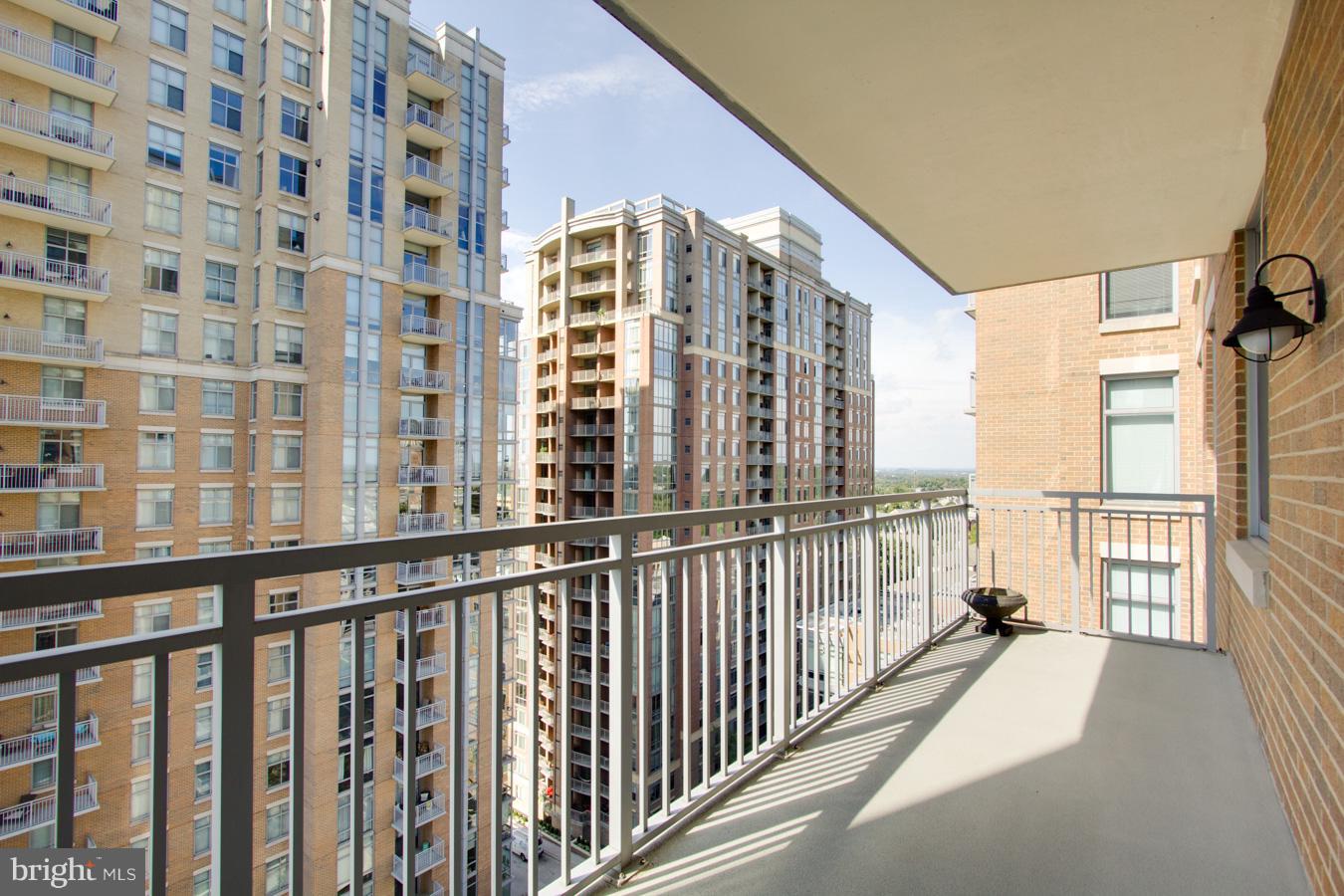 11990 Market Street, Unit 1308 Reston, VA 20190 - Photo 19 of 30 a view of a large building with a large window
