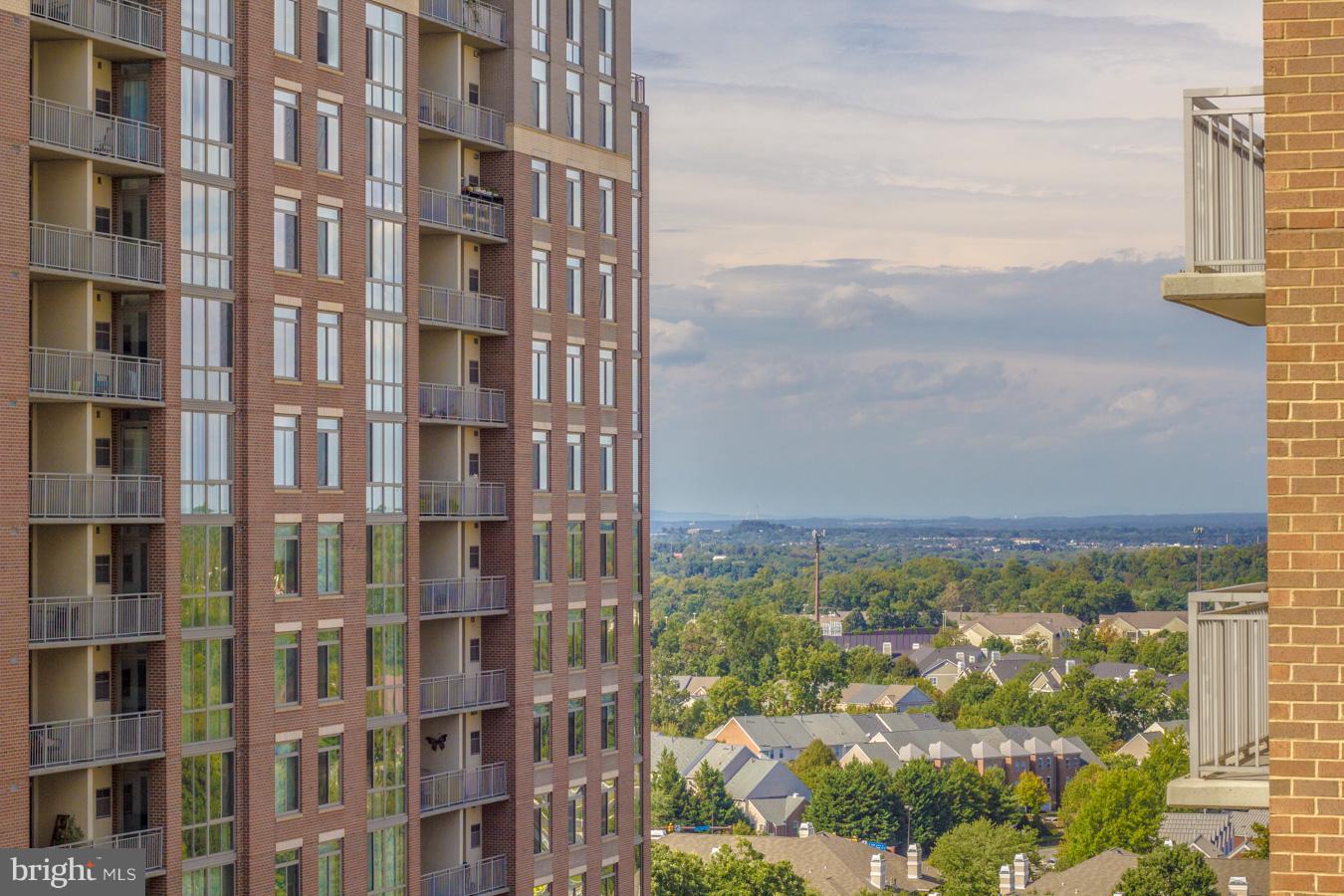 11990 Market Street, Unit 1308 Reston, VA 20190 - Photo 20 of 30 a view of a city with tall buildings