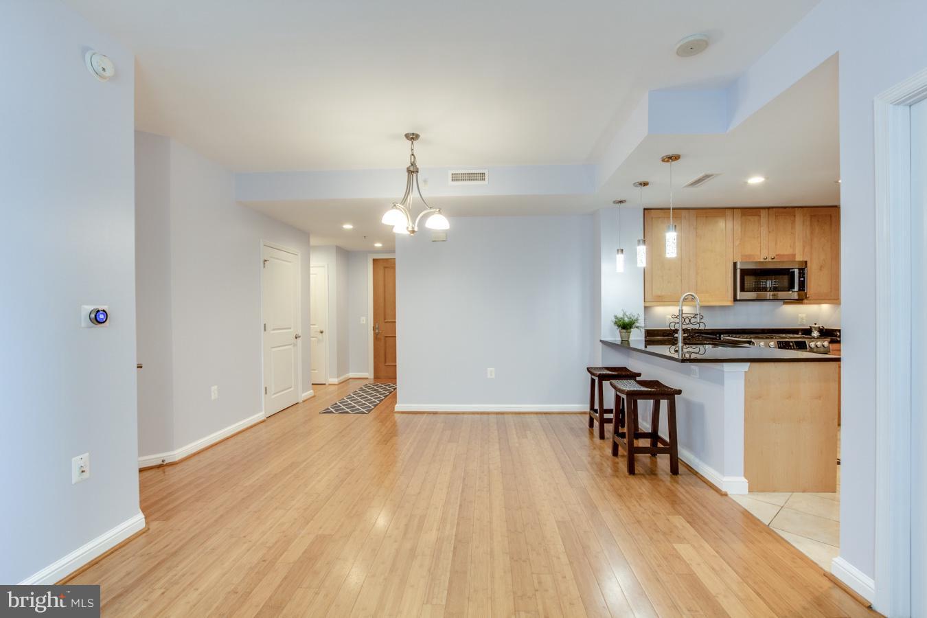 11990 Market Street, Unit 1308 Reston, VA 20190 - Photo 3 of 30 a view of kitchen with sink and refrigerator