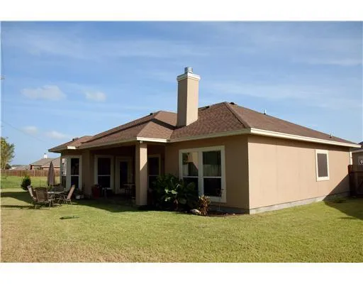 a house view with a garden space