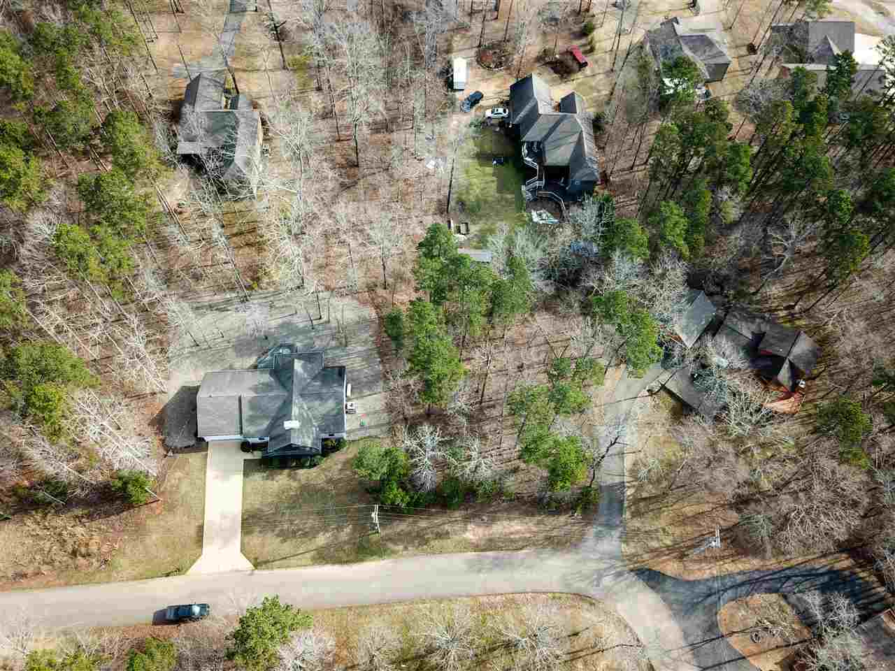4 Rising Sun Lane Counce, TN 38326 - Photo 15 of 16 a backyard of a house with a yard and outdoor seating