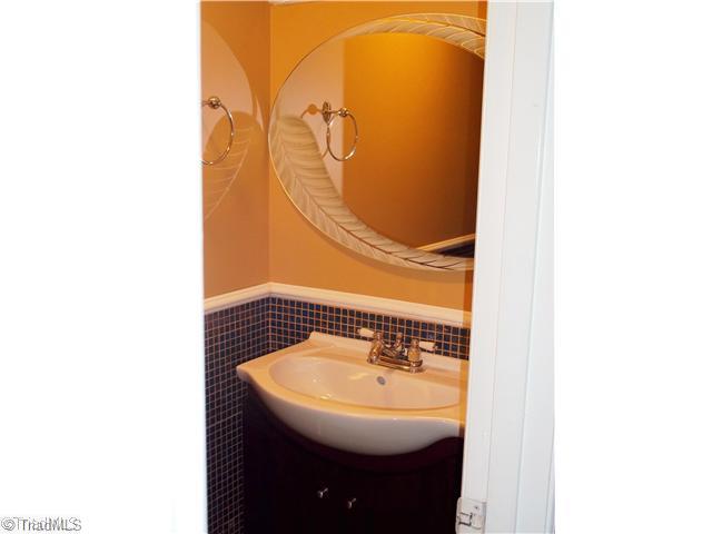 1829 D Johnson Street High Point, NC 27262 - Photo 7 of 14 Other Bath. Powder Room right off Entry Hallway...Look at the Mosaic Glass Tile around the lower portion of the wall