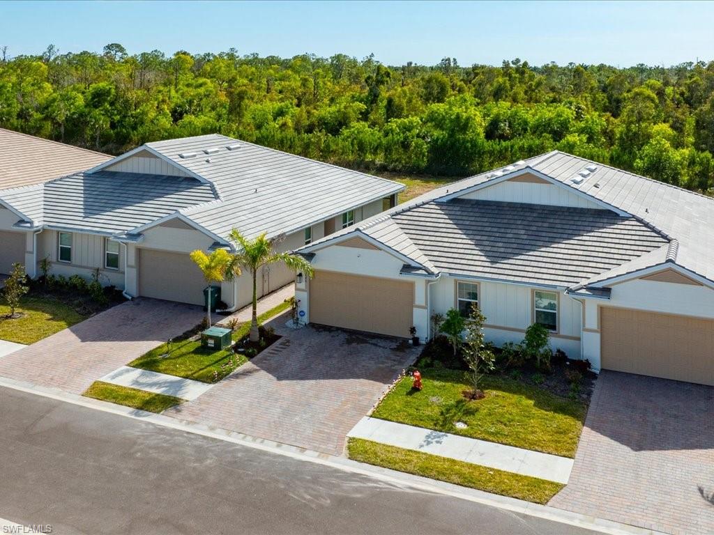 1046 Enbrook Loop Naples, FL 34114 - Photo 29 of 43 Drone / aerial view