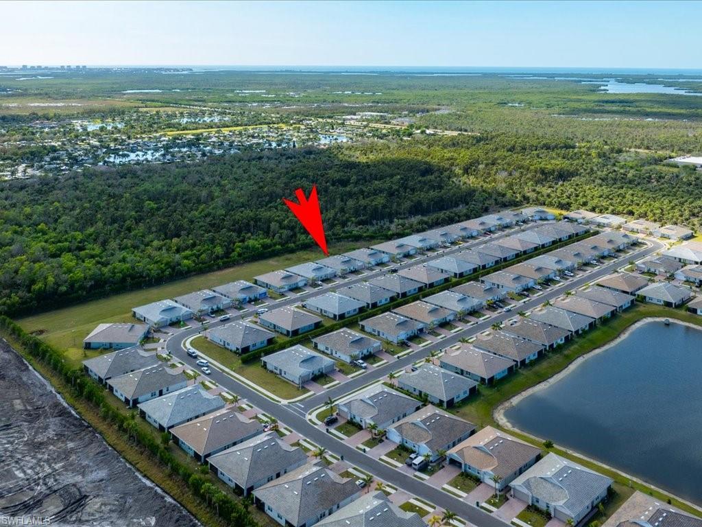 1046 Enbrook Loop Naples, FL 34114 - Photo 35 of 43 Aerial view with a water view