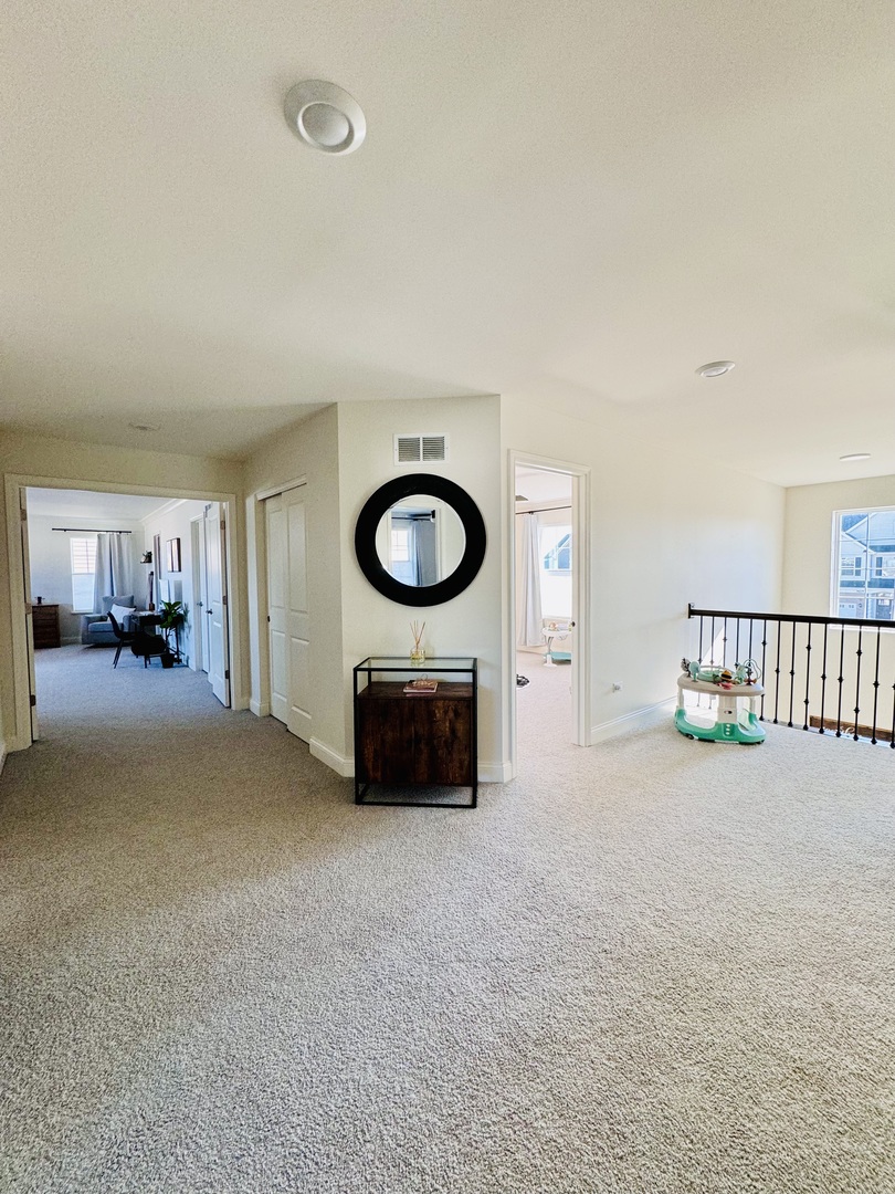 3626 Edelweiss Road Elgin, IL 60124 - Photo 13 of 28 a view of a livingroom with furniture and a fireplace