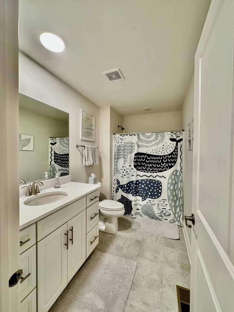 3626 Edelweiss Road Elgin, IL 60124 - Photo 19 of 28 a bathroom with a double vanity sink toilet and mirror