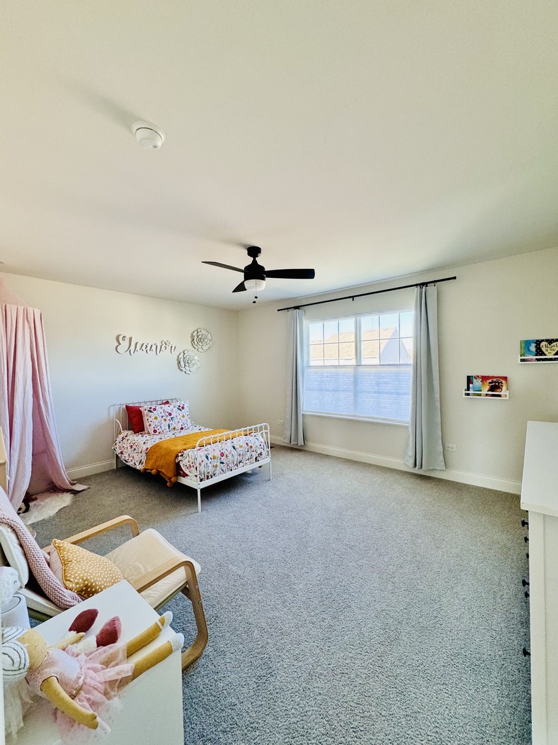 3626 Edelweiss Road Elgin, IL 60124 - Photo 20 of 28 a view of a livingroom with furniture and window
