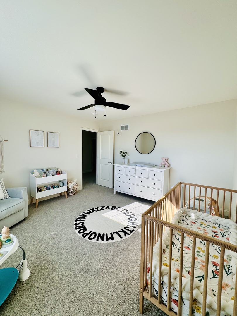 3626 Edelweiss Road Elgin, IL 60124 - Photo 23 of 28 a bedroom with furniture and a large window