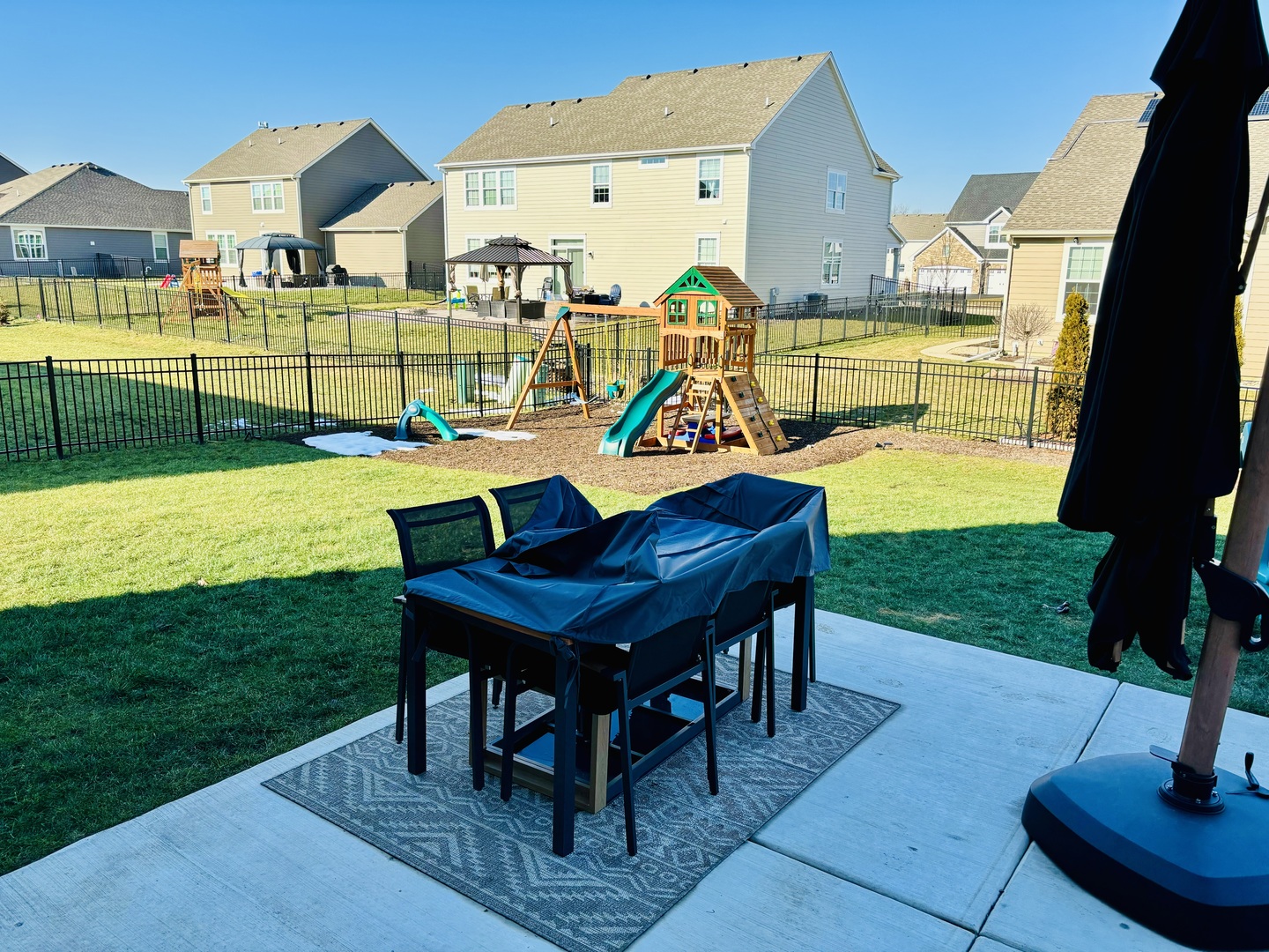 3626 Edelweiss Road Elgin, IL 60124 - Photo 27 of 28 a view of a house with backyard porch and furniture