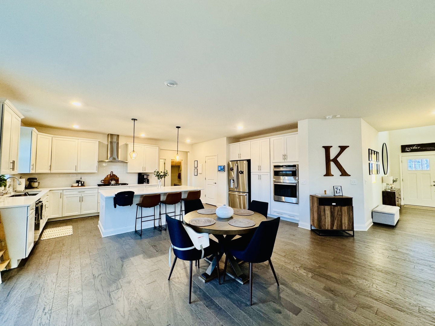 3626 Edelweiss Road Elgin, IL 60124 - Photo 8 of 28 a view of a dining room with furniture and wooden floor